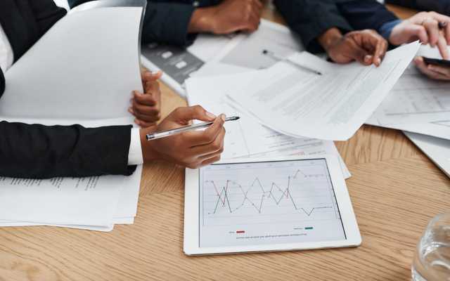 Clinician reviewing care audit documentation